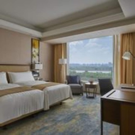 Imagen de la habitación del Hotel Songbei Shangri-La Harbin. Foto 6