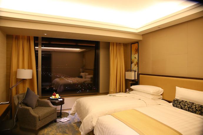 Imagen de la habitación del Hotel Songbei Shangri-La Harbin. Foto 7