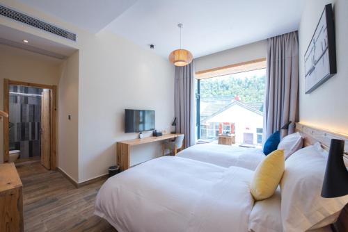 Imagen de la habitación del Hotel Songe Wei Boutique. Foto 6