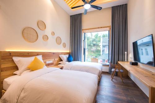 Imagen de la habitación del Hotel Songe Wei Boutique. Foto 8