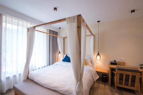 Imagen de la habitación del Hotel Songe Wei Boutique. Foto 9