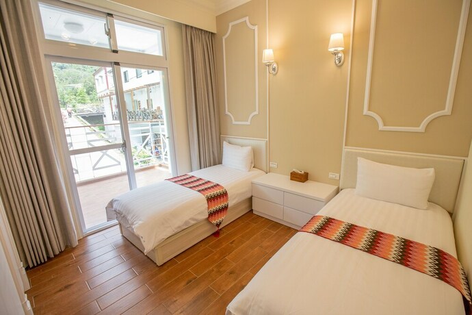 Imagen de la habitación del Hotel Songhe Shanshuei Bandb. Foto 23