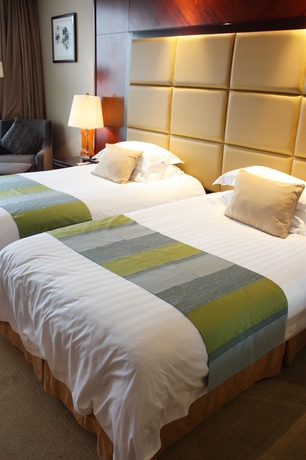 Imagen de la habitación del Hotel Songjiang New Century Grand Shanghai. Foto 4