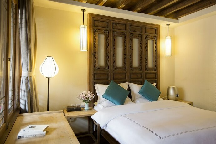 Imagen de la habitación del Hotel Songshi Guqin Inn. Foto 11