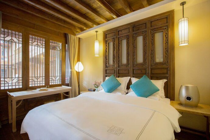 Imagen de la habitación del Hotel Songshi Guqin Inn. Foto 12