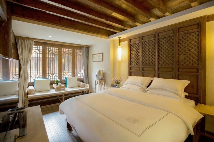 Imagen de la habitación del Hotel Songshi Guqin Inn. Foto 13