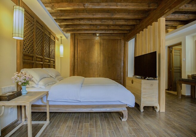 Imagen de la habitación del Hotel Songshi Guqin Inn. Foto 16