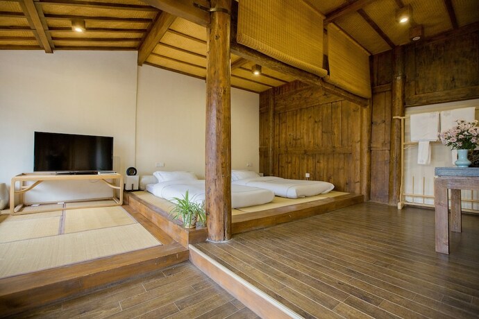 Imagen de la habitación del Hotel Songshi Guqin Inn. Foto 18