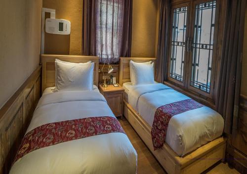 Imagen de la habitación del Hotel Songtsam Choskyi Linka Lhasa. Foto 8