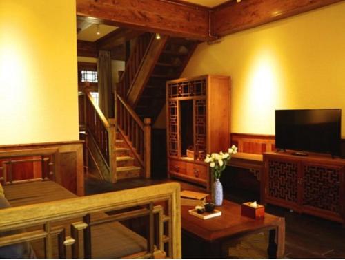Imagen de la habitación del Hotel Songtsam Linka Lijiang. Foto 6