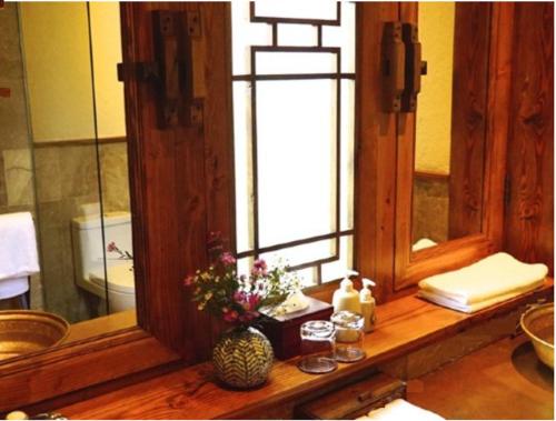 Imagen de la habitación del Hotel Songtsam Linka Lijiang. Foto 7