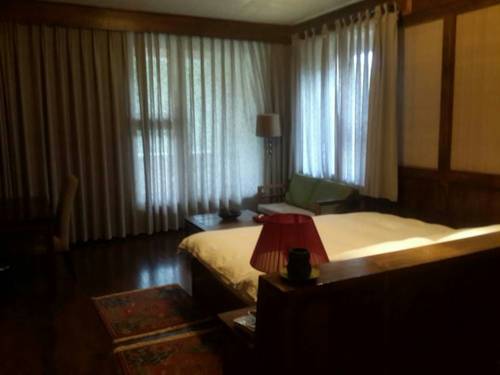 Imagen de la habitación del Hotel Songtsam Meili Lodge. Foto 8