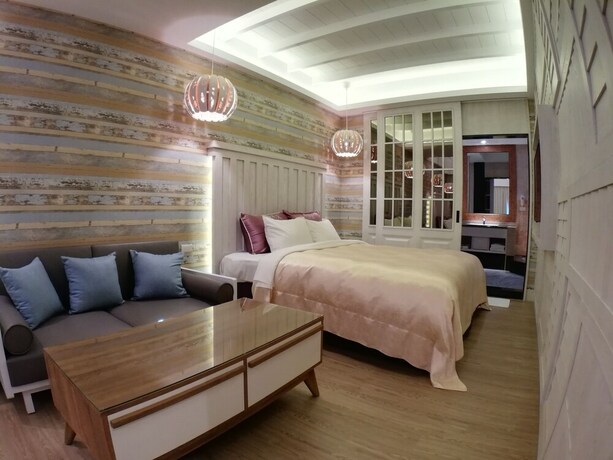 Imagen de la habitación del Hotel Songxiamotel. Foto 16