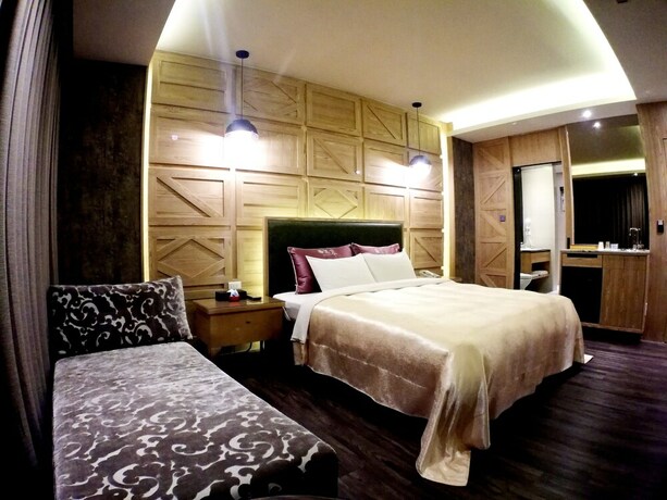 Imagen de la habitación del Hotel Songxiamotel. Foto 22