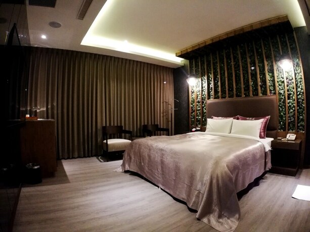 Imagen de la habitación del Hotel Songxiamotel. Foto 23