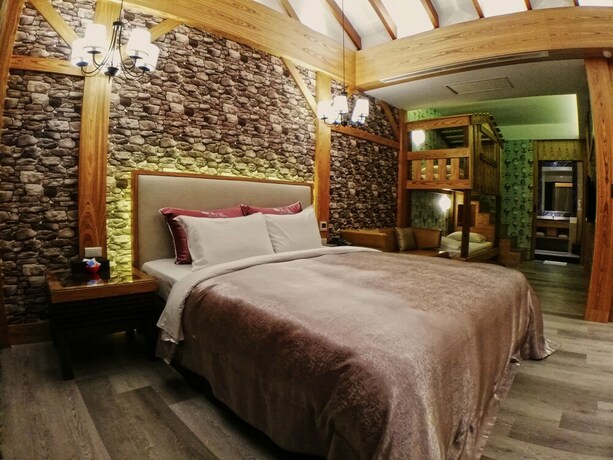 Imagen de la habitación del Hotel Songxiamotel. Foto 24
