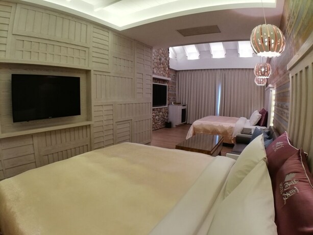 Imagen de la habitación del Hotel Songxiamotel. Foto 29