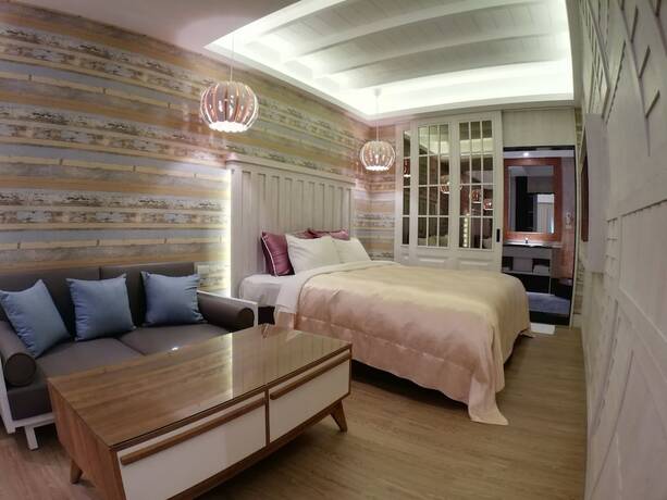 Imagen de la habitación del Hotel Songxiamotel. Foto 34