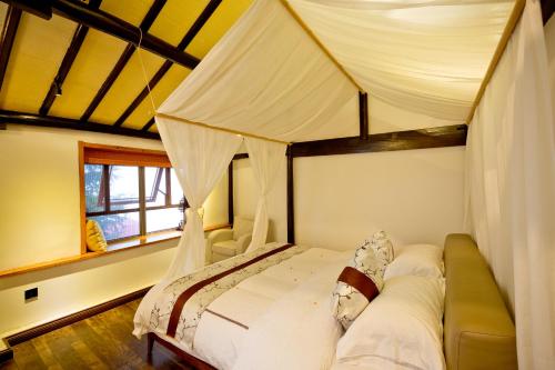 Imagen de la habitación del Hotel Songyang Yunding Xiankengyuan Resort. Foto 7