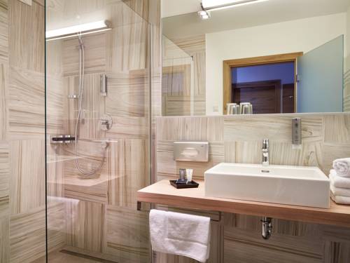 Imagen de la habitación del Hotel Sonja Alpine Resort. Foto 6