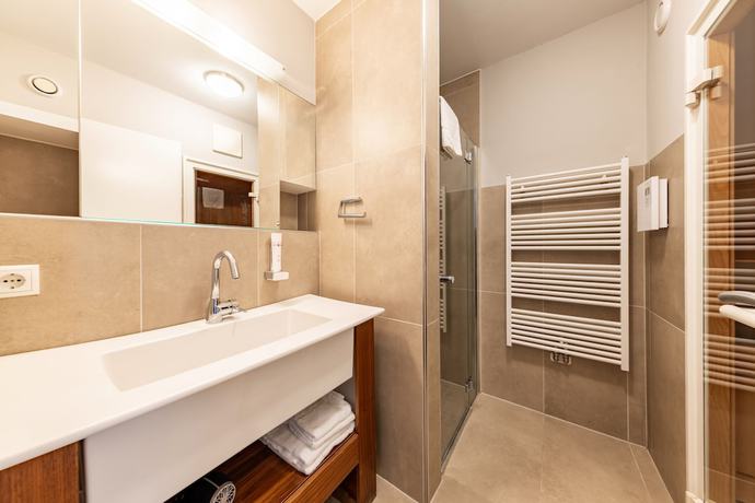 Imagen de la habitación del Hotel Sonnberg Alpinlodges. Foto 3