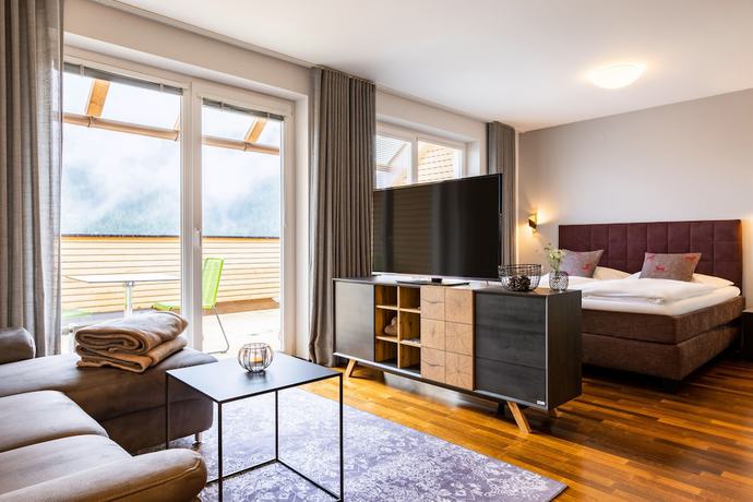 Imagen de la habitación del Hotel Sonnberg Alpinlodges. Foto 4