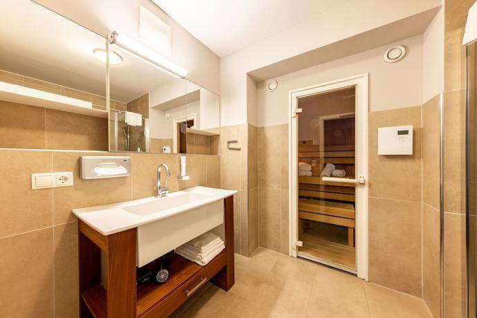 Imagen de la habitación del Hotel Sonnberg Alpinlodges. Foto 14