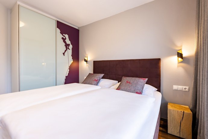 Imagen de la habitación del Hotel Sonnberg Alpinlodges. Foto 16
