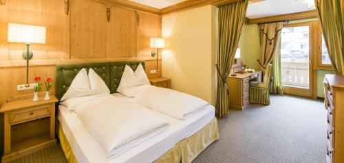 Imagen de la habitación del Hotel Sonnenhof Sun/spa/panorama. Foto 9