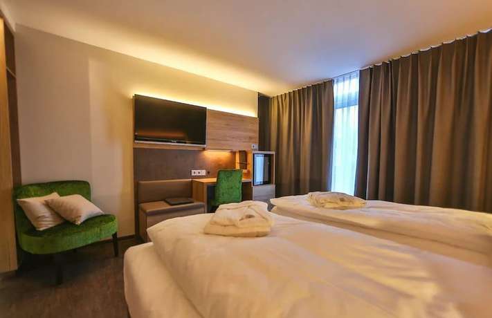 Imagen de la habitación del Hotel Sonnenhotel Weingut R&ouml;mmert. Foto 15
