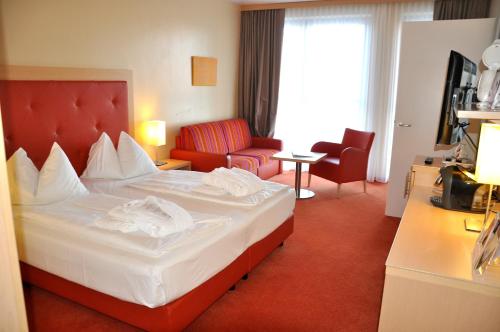 Imagen de la habitación del Hotel Sonnenpark & Therme (included). Foto 5