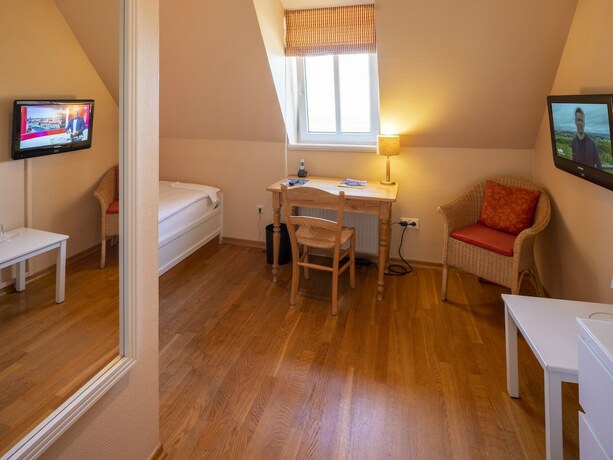 Imagen de la habitación del Hotel Sonnenresort H&uuml;ttmann, Norddorf auf Amrum. Foto 20