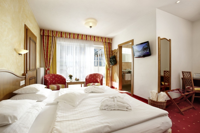 Imagen de la habitación del Hotel Sonnhof Alpendorf. Foto 7
