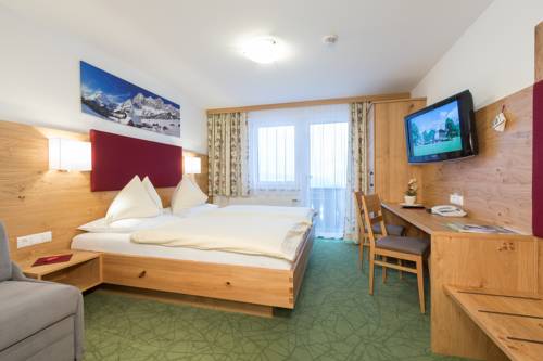 Imagen de la habitación del Hotel Sonnhof, Ramsau am Dachstein. Foto 10