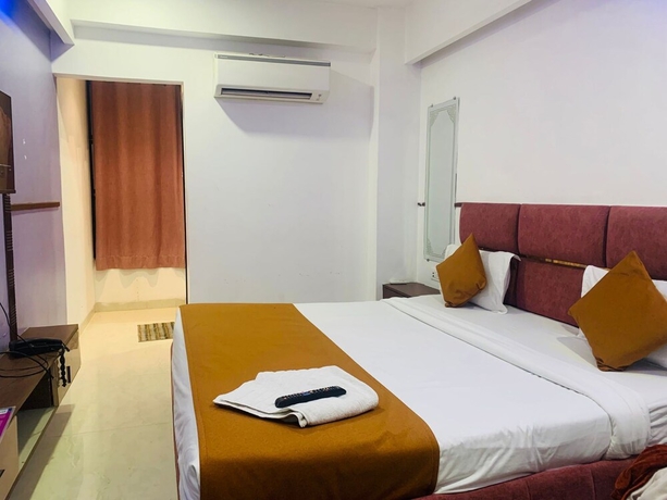 Imagen de la habitación del Hotel SoonStay Elite Residency. Foto 7