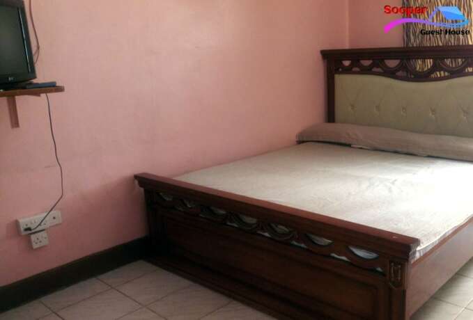 Imagen de la habitación del Hotel Sooper Guest House. Foto 5