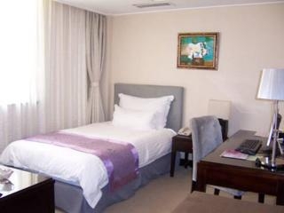 Imagen de la habitación del Hotel Sophia, Qingdao. Foto 2