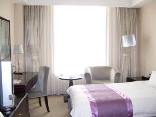 Imagen de la habitación del Hotel Sophia, Qingdao. Foto 3