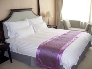 Imagen de la habitación del Hotel Sophia, Qingdao. Foto 5