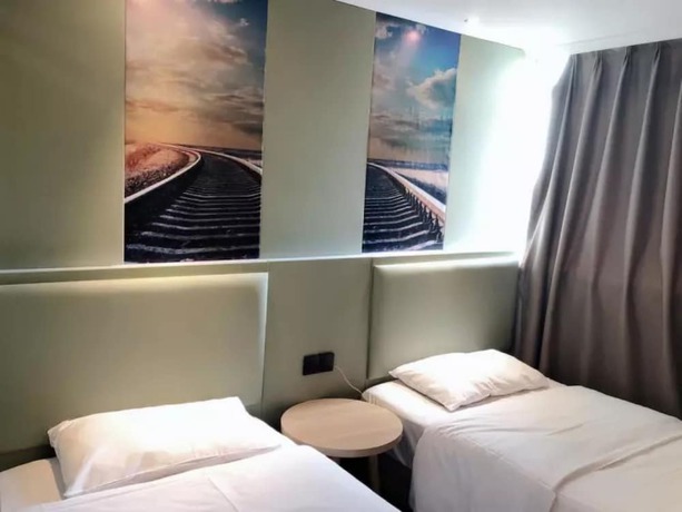 Imagen de la habitación del Hotel Sophie Roland Shenzhen Huaxin. Foto 2