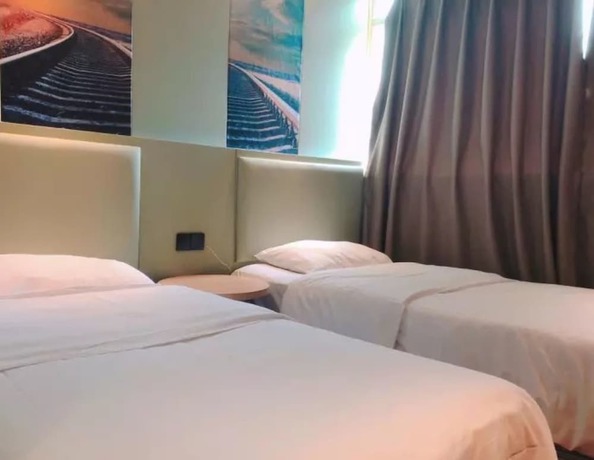 Imagen de la habitación del Hotel Sophie Roland Shenzhen Huaxin. Foto 9