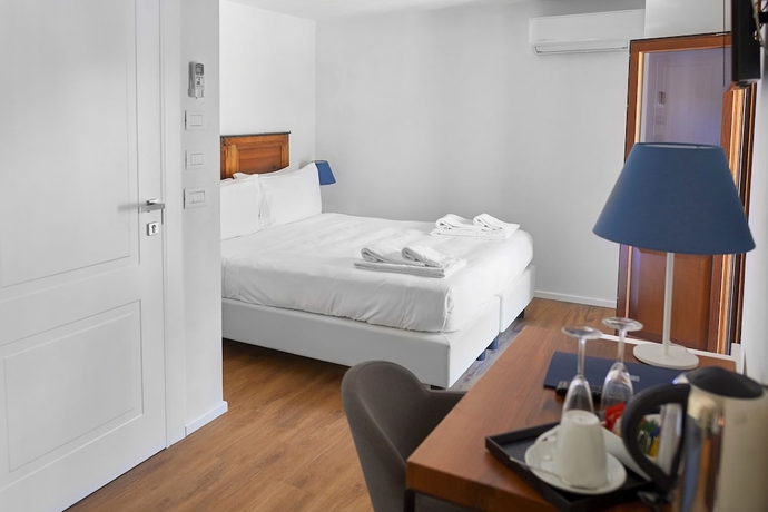 Imagen de la habitación del Hotel Sopra Le Mura. Foto 4