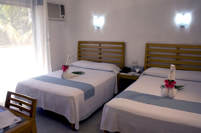 Imagen de la habitación del Hotel Sotavento and Yacht Club. Foto 5