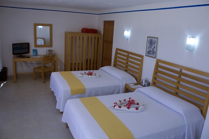 Imagen de la habitación del Hotel Sotavento and Yacht Club. Foto 6