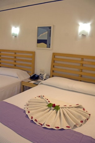 Imagen de la habitación del Hotel Sotavento and Yacht Club. Foto 7