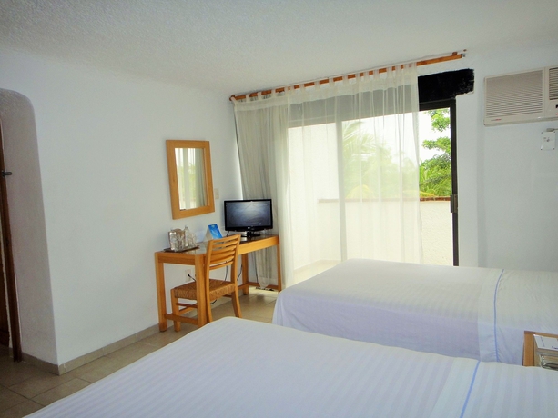 Imagen de la habitación del Hotel Sotavento and Yacht Club. Foto 8