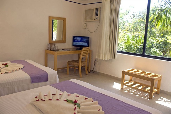 Imagen de la habitación del Hotel Sotavento and Yacht Club. Foto 11