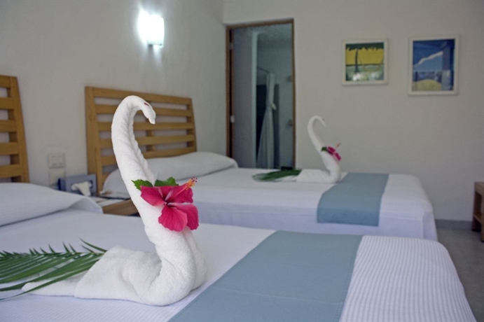 Imagen de la habitación del Hotel Sotavento and Yacht Club. Foto 12