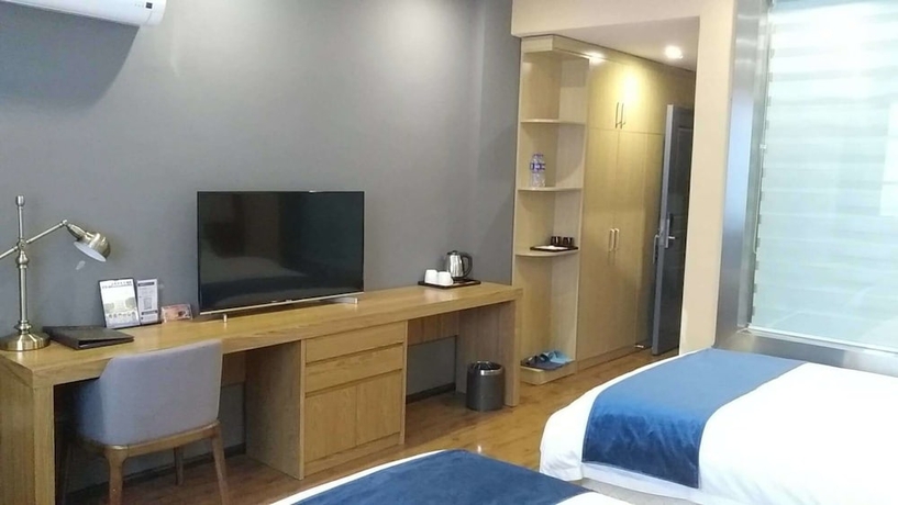 Imagen de la habitación del Hotel Sotel Cultura Huangguoshu Branch. Foto 3