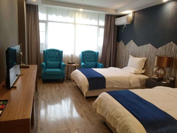 Imagen de la habitación del Hotel Sotel Cultura Huangguoshu Branch. Foto 6